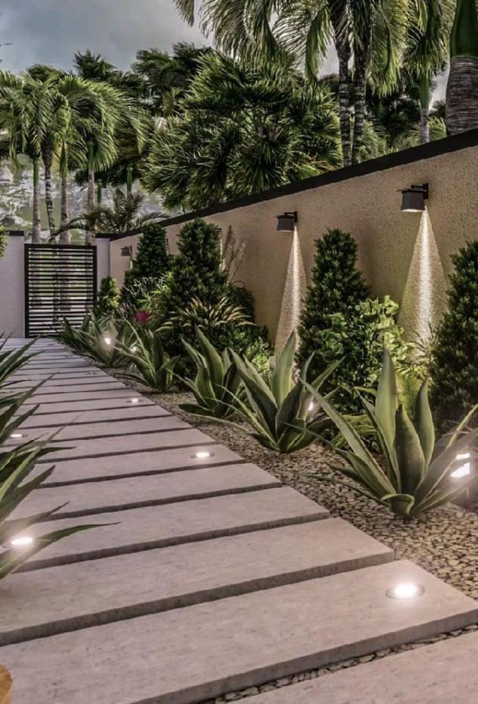 Aaradhayam landscaped walkway at dusk